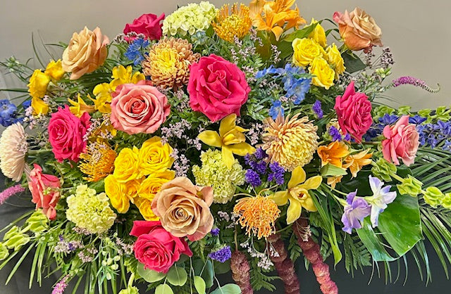 Radiant Farewell Casket Flowers