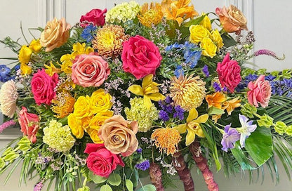 Radiant Farewell Casket Flowers